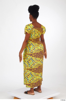  Dina Moses dressed standing whole body yellow long decora apparel african dress 0004.jpg